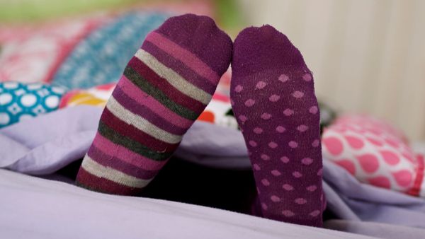 colorful socks under cover