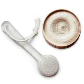 facial massaging brush and honey scrub isolated on white