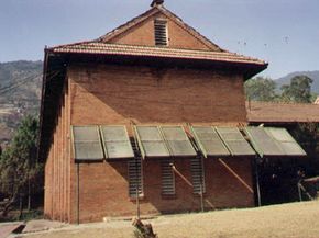 This school in Nepal uses solar water heater collector panels.