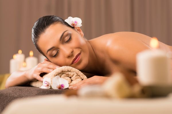 A woman relaxing at beauty spa.