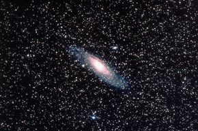 Andromeda, the nearest large galaxy to our own. Will our solar system get swallowed up in a massive galactic collision?