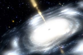 This illustration shows a galaxy with a supermassive black hole at its core. (The black hole is also shooting out radio waves.)
