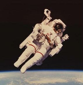 Astronaut Bruce McCandless II floated freely in space while testing the Manned Maneuvering Unit (MMU) during an early shuttle flight.