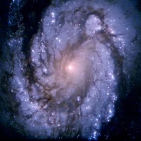 The spiral galaxy M100, as seen through the Hubble telescope.