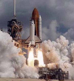 space shuttle taking off into space