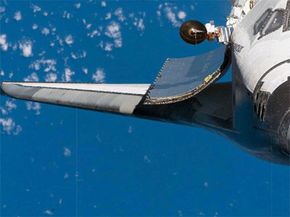 space shuttle orbiting in the thermosphere