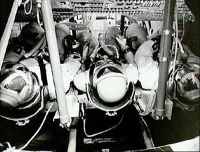 There wasn't much elbow room in the Apollo command module during takeoff and landing.