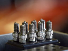 Spark plugs are one of the few things that an amateur mechanic can repair without much trouble. See pictures of car engines.