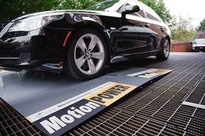 MotionPower generates electricity as a car drives over the device at the Four Seasons Hotel in Washington, DC.