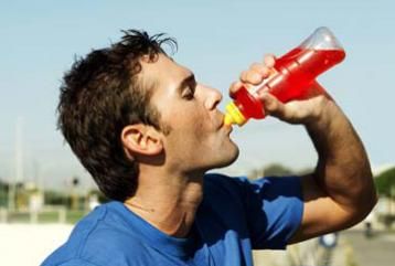 guy drinking sports drinks