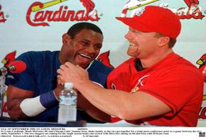 St. Louis Cardinal Mark McGwire (right) and Chicago Cub Sammy Sosa shown in happier times during a 1998 press conference prior to a game between the two clubs when they were duking it out for the home run record.