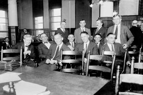 Group portrait of some of the "Black Sox" (seated left to right): "Chick" Gandil, "Lefty" Williams, "Swede" Risberg, Eddie Cicotte, "Buck" Weaver, and "Shoeless" Joe Jackson, all smiles after being acquitted in August 1921.”border=