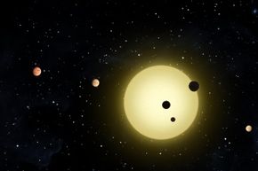That's Kepler-11, a sun-like star around which six planets orbit. At times, two or more planets pass in front of the star at once. This planetary system was picked up by NASA's Kepler spacecraft on Aug. 26, 2010. Kind of makes you want to start looking, too, doesn't it?