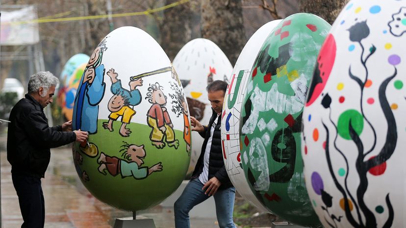 A group of artists decorates giant eggs to mark the Nowruz (Persian New Year) in Tehran, Iran, March 6, 2023. Fatemeh Bahrami/Anadolu Agency via Getty Images