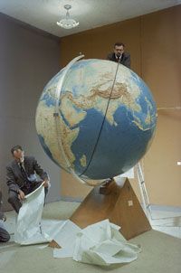 Astrophysicists J. Allen Hynek and Fred Whipple plot the orbit of Sputnik at Harvard.