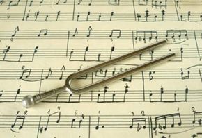 Tuning fork on sheet music