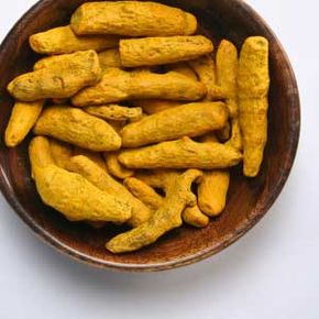 Turmeric is a main ingredient in curry and mustard, imparting flavor and its characteristic yellow color. See more pictures of spices.