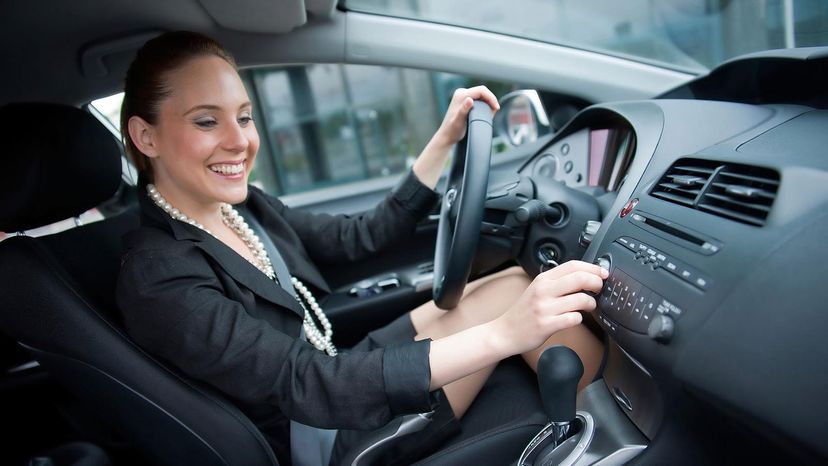 woman at car radio