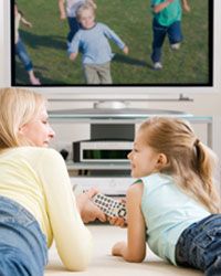 Mom and daughter watching TV