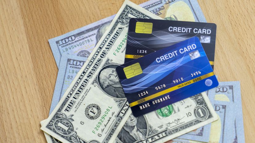 Credit cards and dollars in cash