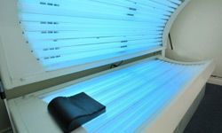 A tanning bed is open showing all it's lights. Nikon D700 Full Size Sensor Image.