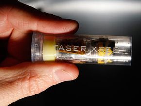 The Taser XREP inside a transparent shotgun shell.  See more pictures of guns and weapons.