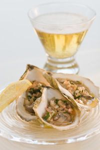 Lightly dressed oysters always have a wow factor, and pair well with herbal or floral beers like India Pale Ales (IPAs).