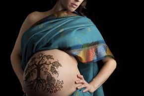 This is a henna tattoo, which is temporary and only penetrates the outer skin layer. But is it safe to get permanent ink when you're pregnant?