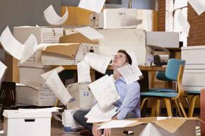 As you struggle with the overflowing paperwork, you may have a number of tax questions. We answer the most common ones. See more &quot;Tax Day Crazy&quot; pictures.