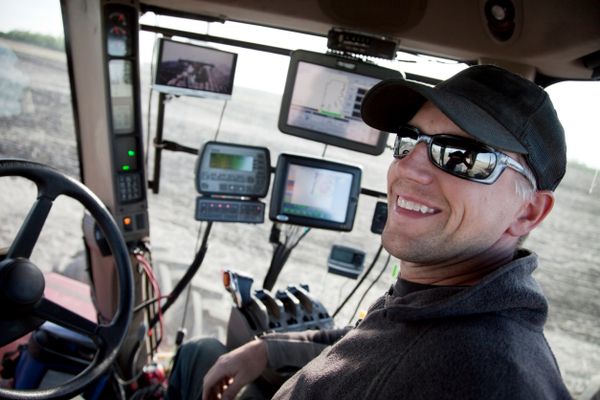 farmer with high tech tractor