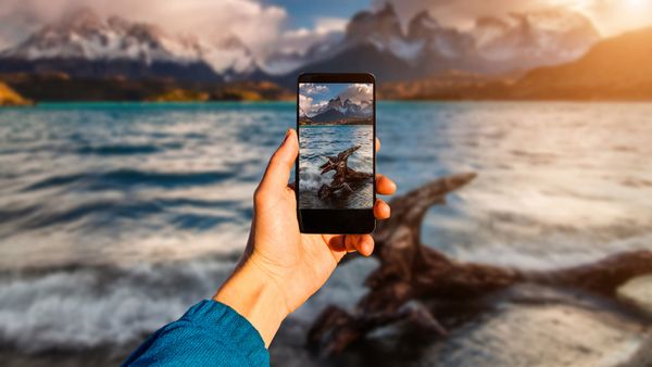 taking scenery shot with smartphone Torres del Paine, Chili