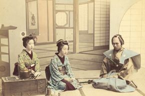 Geisha receive a samurai for tea, circa 1880