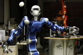 Hey, robots can play catch. Robot Justin, a humanoid two-arm system, developed by the German air and space agency, Deutsches Zentrum fur Luft- und Raumfahrt, can perform given tasks autonomously such as catching balls or serving coffee. See more robot pictures.