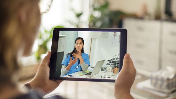 patient with doctor on video