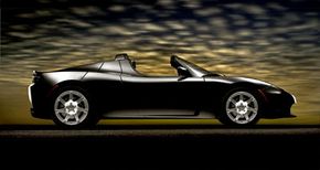 The Tesla Roadster is a high-performance electric car that may rival future 100 mpg cars. Its manufacturer claims it can travel 100 miles for much less than the price of a gallon of gas.