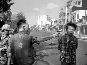 South Vietnamese Gen. Nguyen Ngoc Loan, chief of the national police, executes suspected Viet Cong officer Nguyen Van Lem on Feb. 1, 1968, early in the Tet Offensive. The famous photo remains a defining image of the Vietnam War.