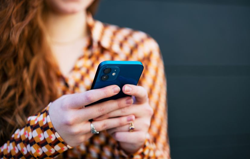 Woman texting on phone