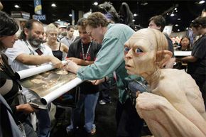 'Lord of the Rings' special effects artist Richard Taylor signs autographs for fans at Comic Con in 2003. You can bet the rotoscope on that film was done by someone else.