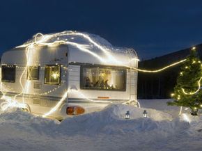 A neat set up for a travel trailer, sure. But with a generator, it would be super cold inside.