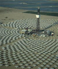 A solar tower surrounded by heliostats