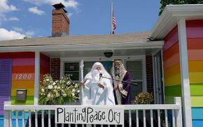 'Gandalf The White' and 'Albus Dumbledore' were married by Davis Hamnet, the director of operations of 'Planting Peace' on the front lawn of Equality House across the street from the Westboro Baptist Church Compound in Topeka, Kansas.