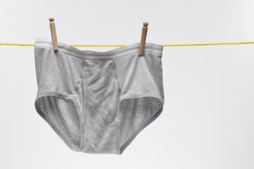 white men's underpants pinned to clothesline