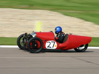 A three-wheeler on a race track