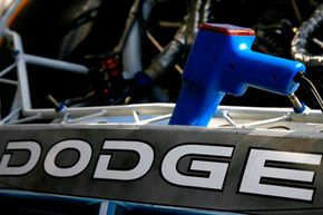 A timing gun is ready to check the engine of the #10 Valvoline Dodge driven by Patrick Carpentier during NASCAR testing at Daytona International Speedway on Jan. 15, 2008 in Daytona Beach, Fla. See more pictures of NASCAR.