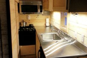 As you can see, the kitchen space is very cramped in tiny houses.