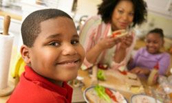 Teaching good eating habits and having family meals together may go a long way toward boosting your tween's body image.