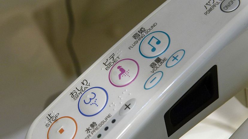 The various functions on the Toto Washlet — including a water spray for the butt — are displayed. Andy Nelson/The Christian Science Monitor/Getty Images