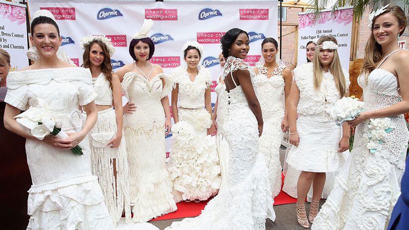 Models pose at the 12th Annual Toilet Paper Wedding Dress Fashion Show in New York City, on June 16, 2016. Robin Marchant/Getty Images