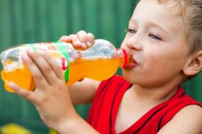 boy drinking soda