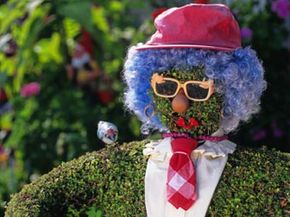 You can shape topiary into anything from formal geometric shapes to this guy. See more pictures of gardens.